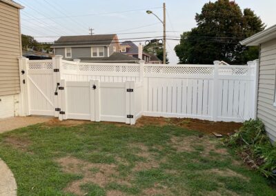 Vinyl fence by Fence Imperial, showcasing a sleek and modern design with low-maintenance features for a contemporary look.