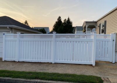 Vinyl fence by Fence Imperial, showcasing a sleek and modern design with low-maintenance features for a contemporary look.