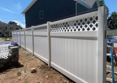 Vinyl fence by Fence Imperial, showcasing a sleek and modern design with low-maintenance features for a contemporary look.