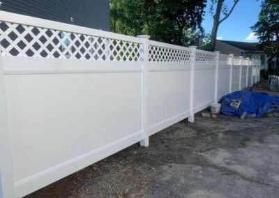 Vinyl fence by Fence Imperial, showcasing a sleek and modern design with low-maintenance features for a contemporary look.