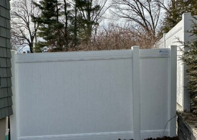 Vinyl fence by Fence Imperial, showcasing a sleek and modern design with low-maintenance features for a contemporary look.