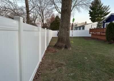 Vinyl fence by Fence Imperial, showcasing a sleek and modern design with low-maintenance features for a contemporary look.