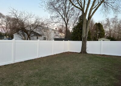 Vinyl fence by Fence Imperial, showcasing a sleek and modern design with low-maintenance features for a contemporary look.