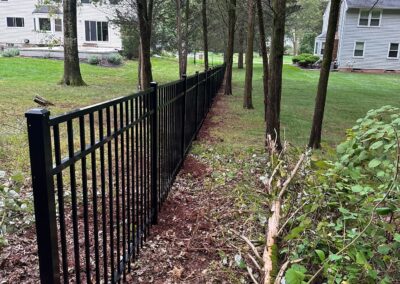 Aluminum fence by Fence Imperial, featuring a sleek and modern design with durable construction for enhanced security and style.