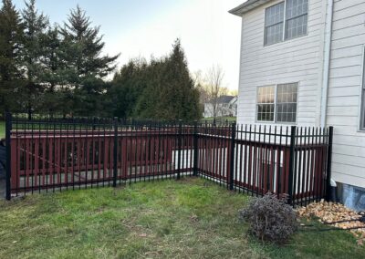 Aluminum fence by Fence Imperial, featuring a sleek and modern design with durable construction for enhanced security and style.