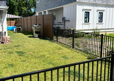 Aluminum fence by Fence Imperial, featuring a sleek and modern design with durable construction for enhanced security and style.