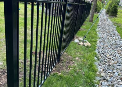 Aluminum fence by Fence Imperial, featuring a sleek and modern design with durable construction for enhanced security and style.