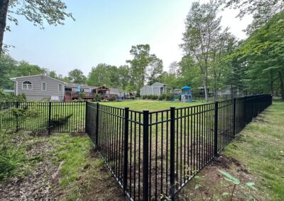 Aluminum fence by Fence Imperial, featuring a sleek and modern design with durable construction for enhanced security and style.