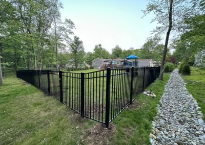 Aluminum fence by Fence Imperial, featuring a sleek and modern design with durable construction for enhanced security and style.