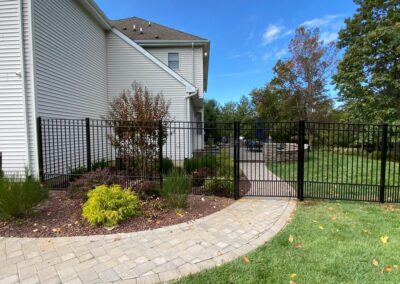 Aluminum fence by Fence Imperial, featuring a sleek and modern design with durable construction for enhanced security and style.