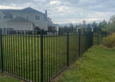 Aluminum fence by Fence Imperial, featuring a sleek and modern design with durable construction for enhanced security and style.