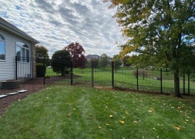 Aluminum fence by Fence Imperial, featuring a sleek and modern design with durable construction for enhanced security and style.