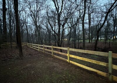 Classic wood fence installed by Fence Imperial, demonstrating elegant craftsmanship and natural beauty for enhancing property aesthetics.